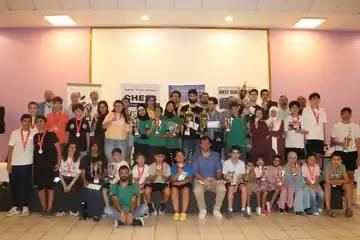 Shamieh Chess tournament players with trophies and medals